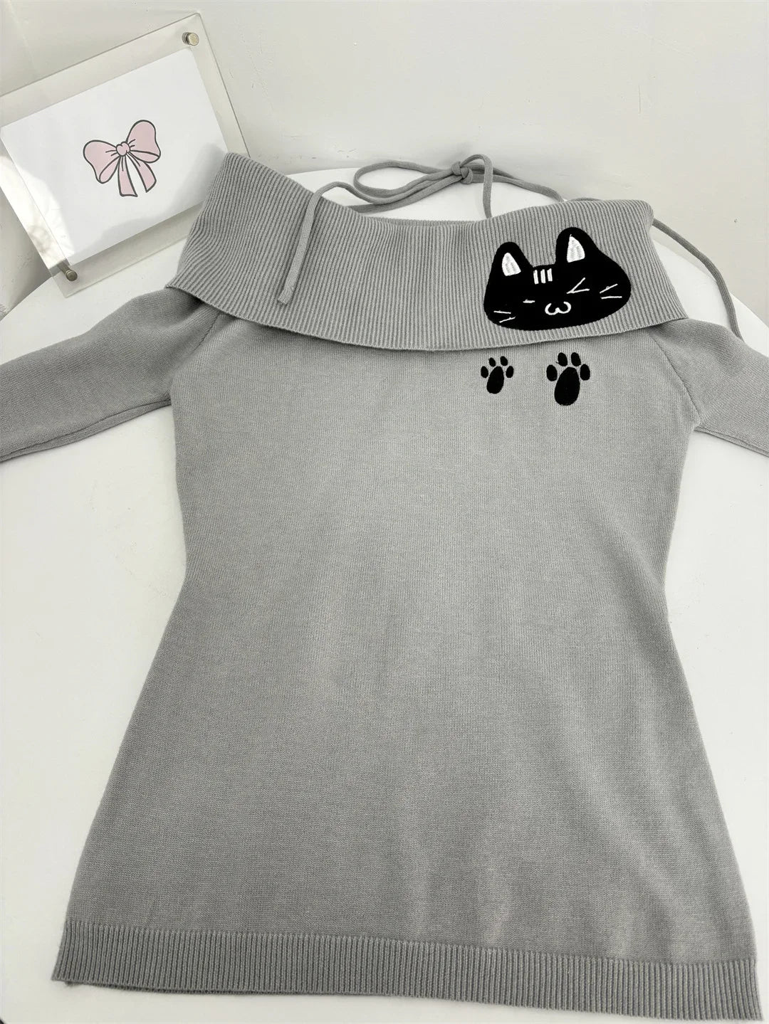 Cat Graphic Off-Shoulder Knit Top and Ruffled Skirt Two-Piece Set