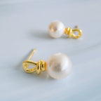 Golden Loop Pearl Drop Earrings – Modern Twist on Classic Elegance