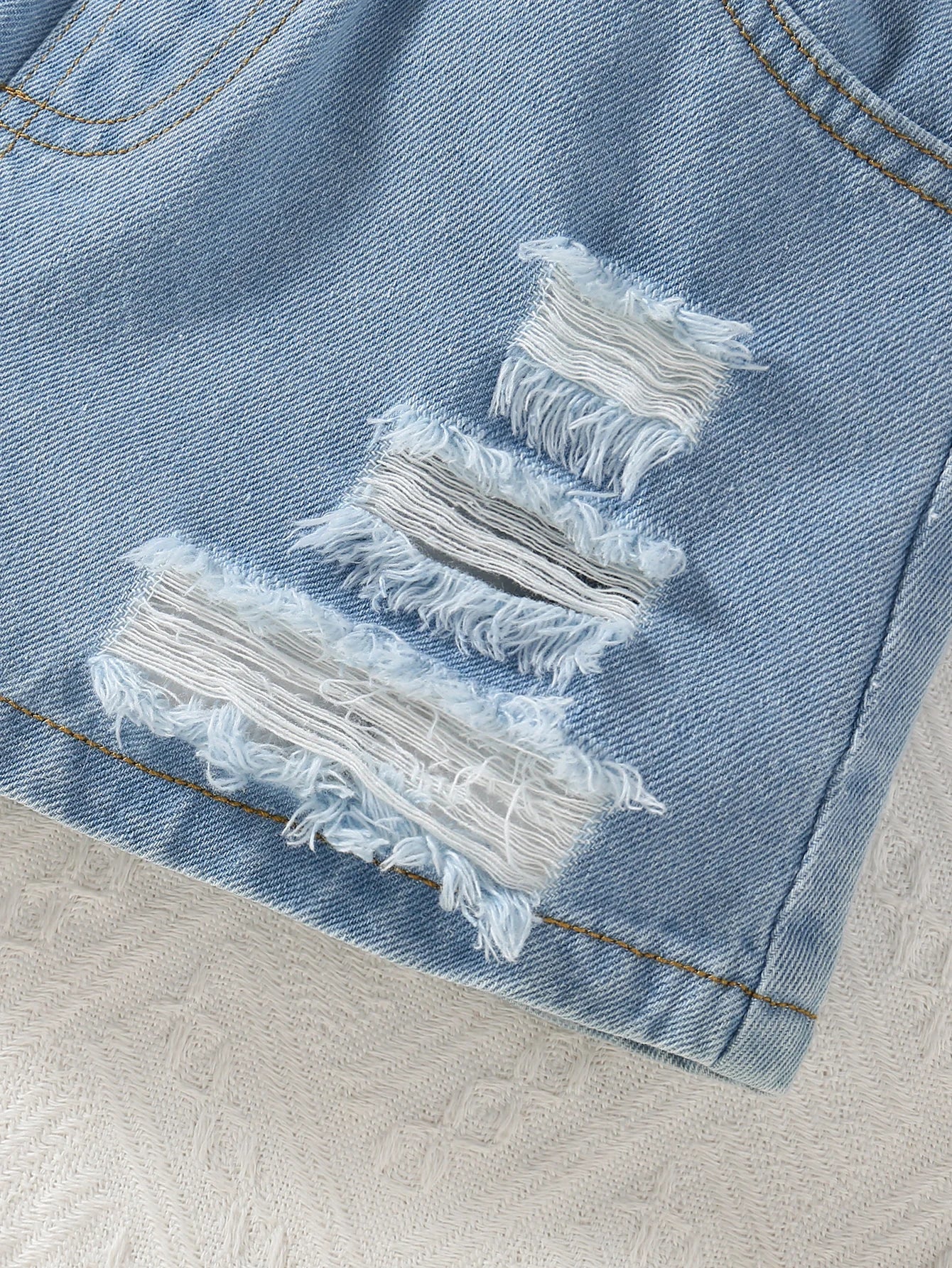 Ripped Denim Shorts