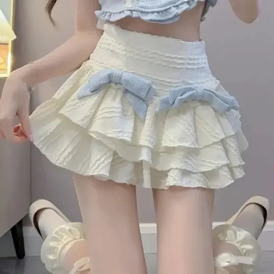 Short-Sleeve Blue Tweed Crop Top and Cream Tiered Ruffle Mini Skirt with Twin Bows