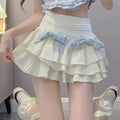 Short-Sleeve Blue Tweed Crop Top and Cream Tiered Ruffle Mini Skirt with Twin Bows