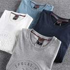 Minimalist Embossed Logo Long Sleeve Tee