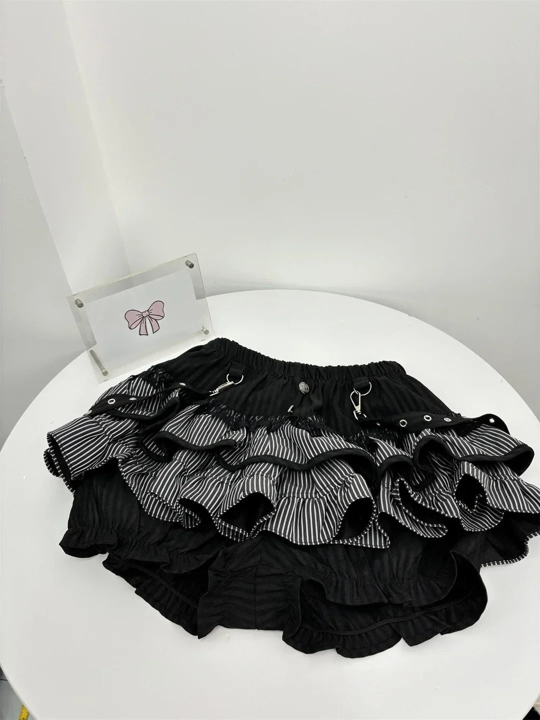 Cat Graphic Off-Shoulder Knit Top and Ruffled Skirt Two-Piece Set