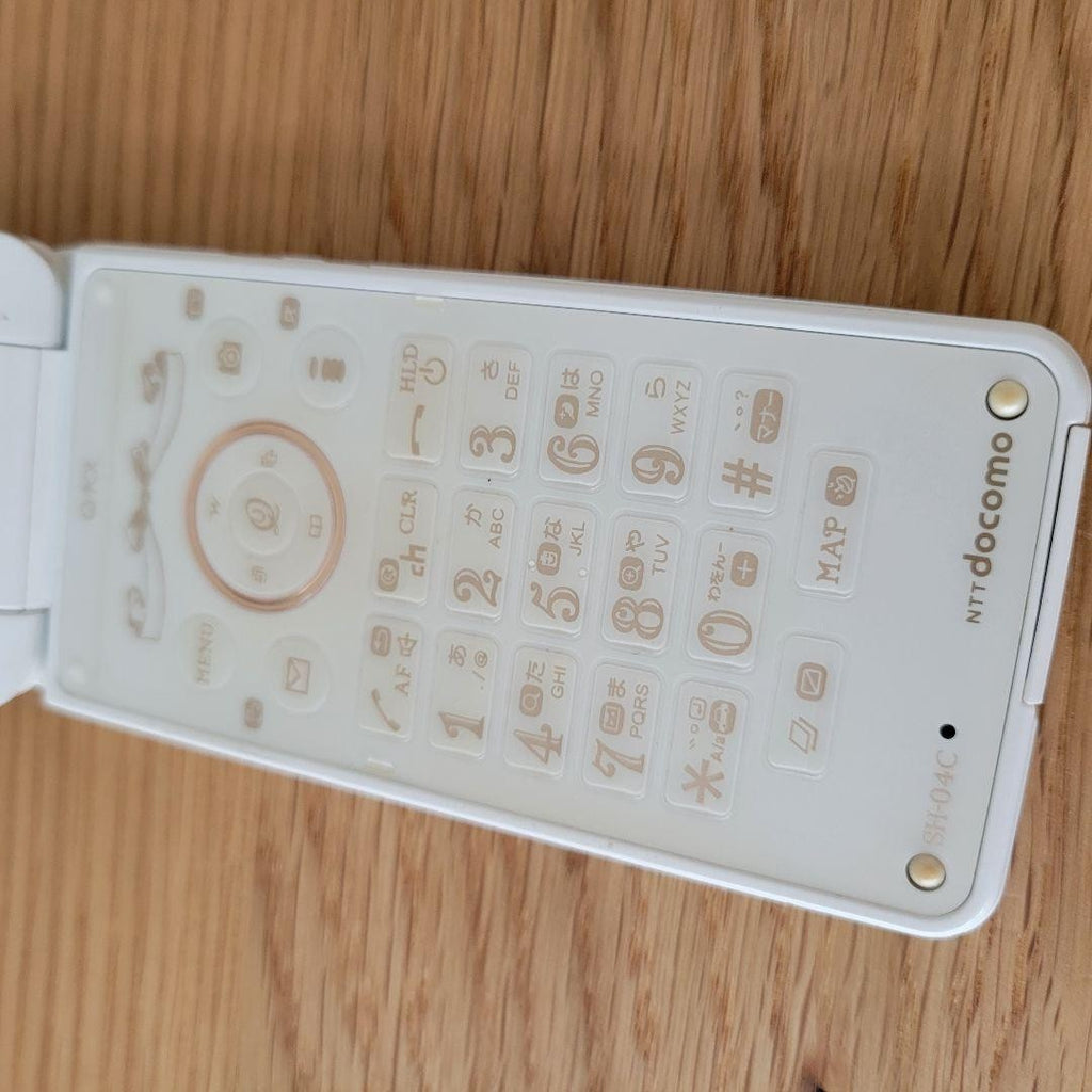 docomo × Q-pot. SH-04C feature phone  main unit Sharp Biscuit white milk Japan