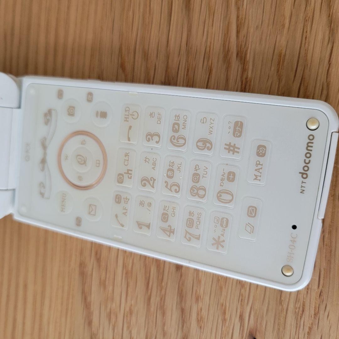 docomo × Q-pot. SH-04C feature phone  main unit Sharp Biscuit white milk Japan